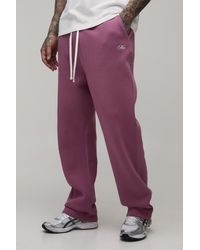 BoohooMAN - Tall Baggy Fit Script Drop Crotch Joggers - Lyst