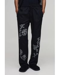 BoohooMAN - Relaxed Fit Linen Blend Floral Embroidery Trousers - Lyst