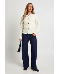 Boohoo - Bow Button Detail Cable Knit Cardigan - Lyst