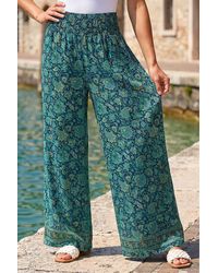 Roman - Floral Print Tiered Palazzo Trousers - Lyst