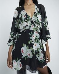 River Island - Long Sleeve Floral Cape Mini Dress - Lyst