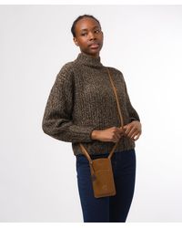 Conkca - Siren' Dark Leather Cross Body Phone Bag - Lyst