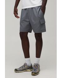 BoohooMAN - Slim Fit Elasticated Technical Stretch Cargo Shorts - Lyst
