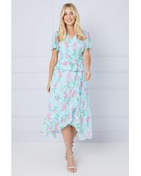 Wallis - Petite Floral Ruffle Peplum Midi Dress - Lyst