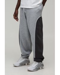 BoohooMAN - Baggy Fit Panelled Cuffed Jogger - Lyst