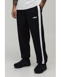 BoohooMAN - Baggy Fit Panelled Bungee Hem Jogger - Lyst