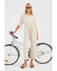 Hiccup - Shirt Collar Pocket Straight Leg Muslin Jumpsuit With A Belt Detail - Lyst
