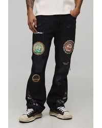 BoohooMAN - Slim Flare Applique Badge Gusset Jeans - Lyst
