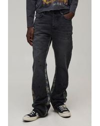 BoohooMAN - Washed Camo Gusset Stacked Flared Jeans - Lyst