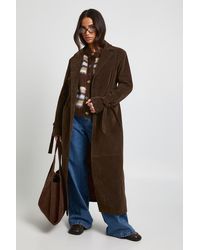 Boohoo - Petite Faux Suede Cinched Longline Coat - Lyst