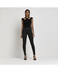 River Island - Skinny Jeans Molly Coated Mid Rise Cotton - Lyst