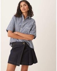 House Of Sunny - Pleated Denim Mini Skirt - Lyst