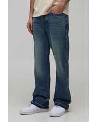 BoohooMAN - Straight Flared Washed Jeans With Let Down Hem - Lyst