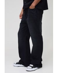 BoohooMAN - Relaxed Flare Washed Black Jeans - Lyst