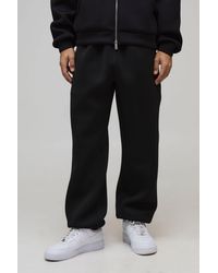 BoohooMAN - Baggy Fit Bonded Scuba Cuffed Joggers - Lyst