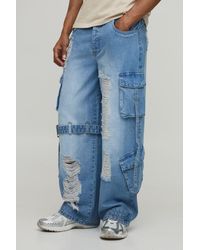 BoohooMAN - Extreme Washed Cargo Strap Detail Baggy Jeans - Lyst