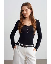Dilvin - Slim-Fit Wool Knit Blouse With Buttons - Lyst