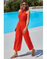 Sosandar - Coral Spot Print Halter Neck Jumpsuit - Lyst