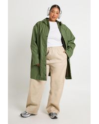 Boohoo - Plus Rubberised Rain Midi Parka Coat - Lyst