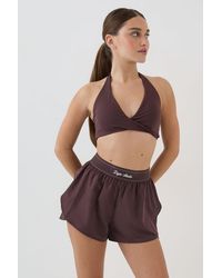 DSGN Studio - Ultra Sculpt Twist Front Light Support Sports Bra - Lyst