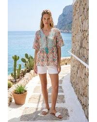 Roman - Floral Print Tassel Neck Top - Lyst