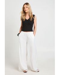 Boohoo - Petite Satin Lace Trim Wide Leg Trousers - Lyst