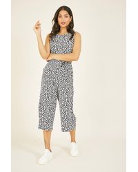 Mela London - Ditsy Daisy Culotte Jumpsuit - Lyst