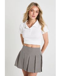 Boohoo - Petite Tonal Mini Check Pleated Skort - Lyst
