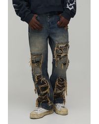 BoohooMAN - Washed Camo Rip & Repair Relaxed Fit Jeans - Lyst