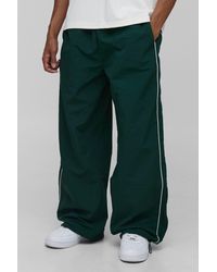 BoohooMAN - Parachute Fit Nylon Piping Detail Pants - Lyst