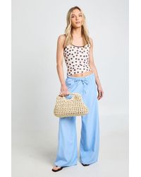 Boohoo - Petite Woven Elasticated Waist Drawstring Wide Leg Trouser - Lyst