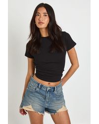 Boohoo - High Waist Ripped Mom Shorts - Lyst