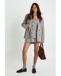 Boohoo - Tonal Mini Check Pleated Skort - Lyst