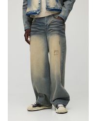 BoohooMAN - Baggy Extreme Washed Bleached Jeans - Lyst