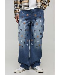 BoohooMAN - Tall Relaxed Rigid Fleur De Lis Embroidered Jeans - Lyst