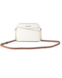 Michael Kors - Jet Set Travel Medium Leather X Cross Dome Crossbody Handbag (Vanilla Signature/ - Lyst