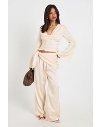 Boohoo - Petite Satin Tie Waist Wide Leg Trouser - Lyst