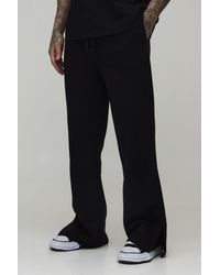 BoohooMAN - Tall Baggy Flared Fit Split Hem Joggers - Lyst