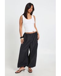 Boohoo - Petite Poplin Low Rise Hareem Trousers - Lyst