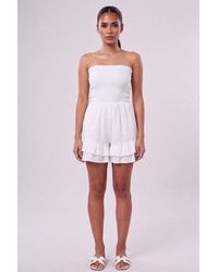 Femme Luxe - Shirred Bandeau Frill Hem Playsuit - Lyst