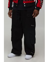 BoohooMAN - Baggy Flare Fit Multi Pocket Elasticated Cargo Trouser - Lyst