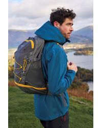 Mountain Warehouse - 'Pace' Rucksack With Bottle Pocket Water Resistant Camping Backpack - Lyst