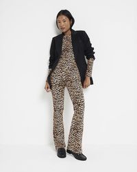 River Island - Petite High Waisted Rib Flare Leggings - Lyst