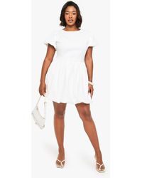 Boohoo - Plus Bonded Textured Puffball Skater Dress - Lyst