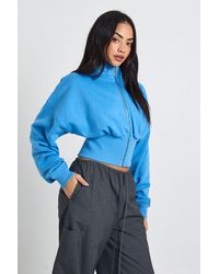 Boohoo - Funnel Neck Cinched Waist Zip Through - Lyst