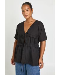 Boohoo - Plus Ruched Tie Front Detail Short Sleeve Smock Top - Lyst
