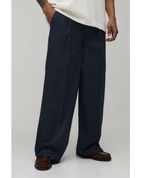 BoohooMAN - Baggy Fit Pinstripe Pleat Front Tailored Trousers - Lyst