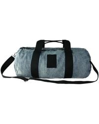 PUMA - X Xo Denim Large Duffle Bag Blue 075296 01 - Lyst