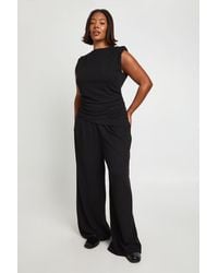 Boohoo - Plus Shoulder Pad Pleated Detail Asym Hem Top And Wide Leg Trousers - Lyst