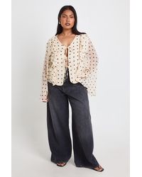 Boohoo - Plus Polka Dot Chiffon Ruffle Tie Front Blouse - Lyst